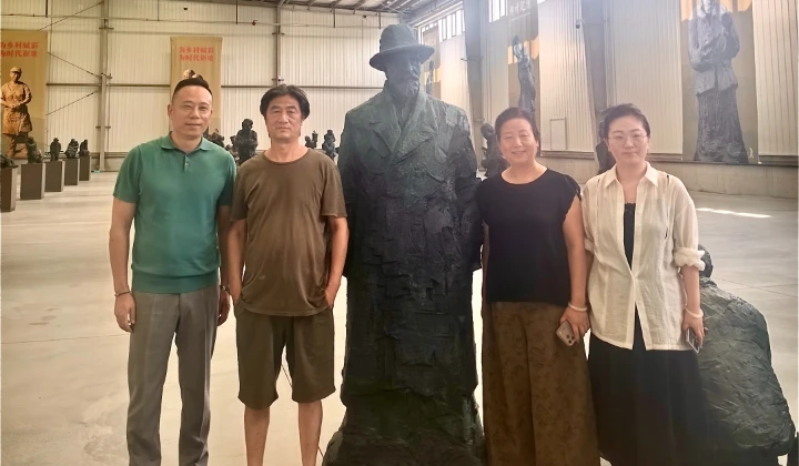 Everyone is taking photos with the statue.